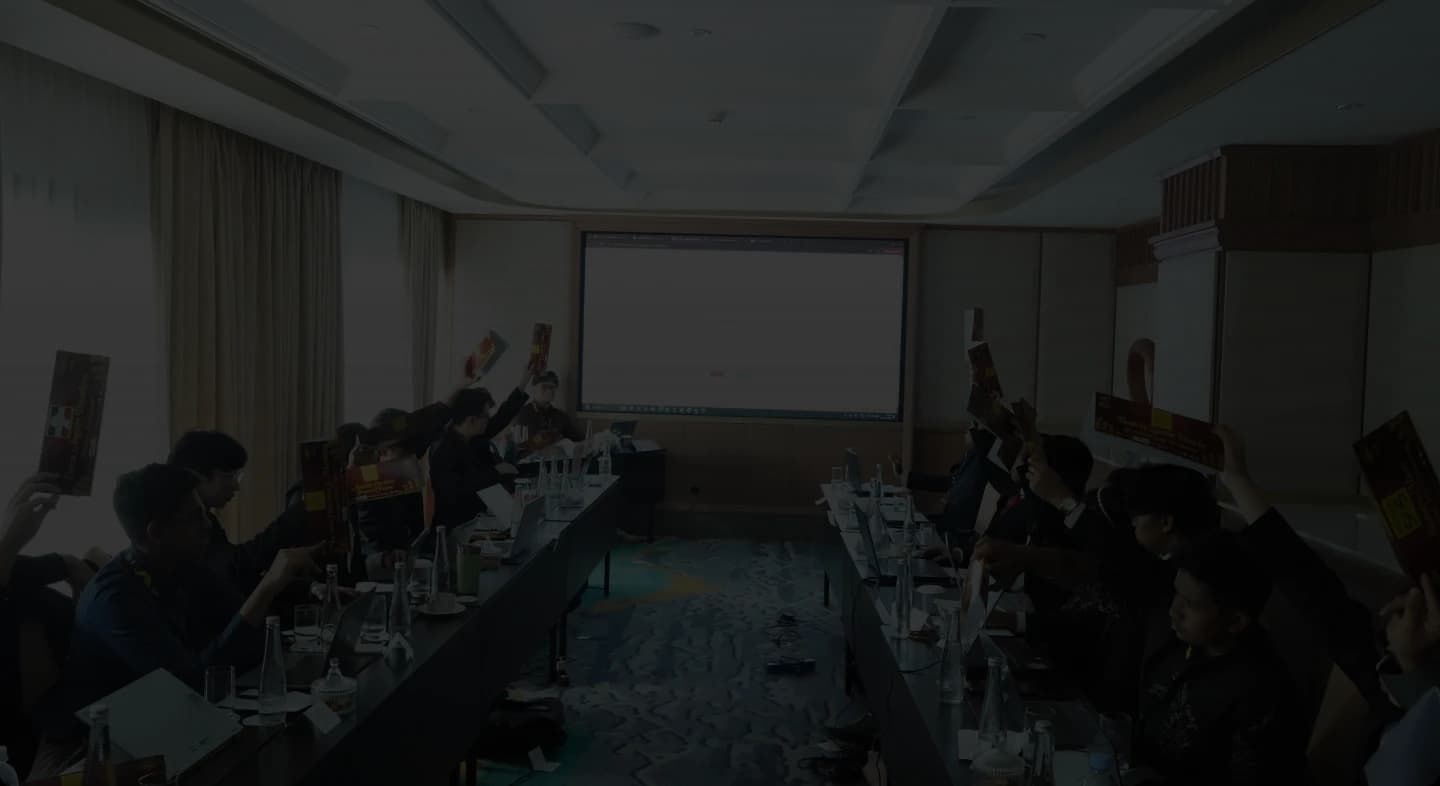 Delegates in a JOINMUN conference session